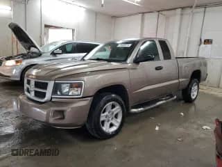 2010 Dodge Dakota с VIN 1D7CE3BK6AS141021, выставлен на аукционе Copart как лот 79409574 с пробегом 126 836 миль миль и Списание • Salvage title. История ставок и продаж доступна на DreamBid. Изображение 1.