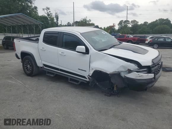 ✅ 2020 Chevrolet Colorado 4WD ZR2 • VIN: 1GCPTEE13L1154592 • Lot: 53695085. Listed on Copart with 35,907 mi. Free auction sales archive from the USA and detailed vehicle history report at DreamBid. Image 4.