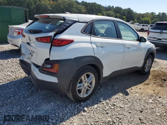 ✅ 2018 Hyundai Kona SE • VIN: KM8K12AA0JU091222 • Лот: 74841194. Опубликован ранее на Copart с пробегом 92 683 миль. Бесплатный доступ к архиву аукционных продаж из США и подробный отчёт об истории автомобиля на DreamBid. Изображение 3.