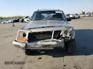 ✅ 2001 Jeep Cherokee Limited • VIN: 1J4FT58S11L512316 • Lot: 80402703. Listed on Copart with 201,265 mi. Free auction sales archive from the USA and detailed vehicle history report at DreamBid. Image 12.