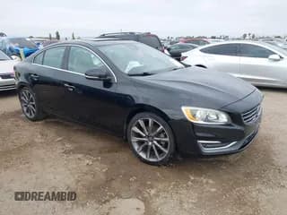 ✅ 2015 Volvo S60 T5 Drive-E Premier • VIN: YV140MFK4F1352447 • Lot: 42783582. Listed on IAAI with 72,780 mi. Free auction sales archive from the USA and detailed vehicle history report at DreamBid. Image 1.
