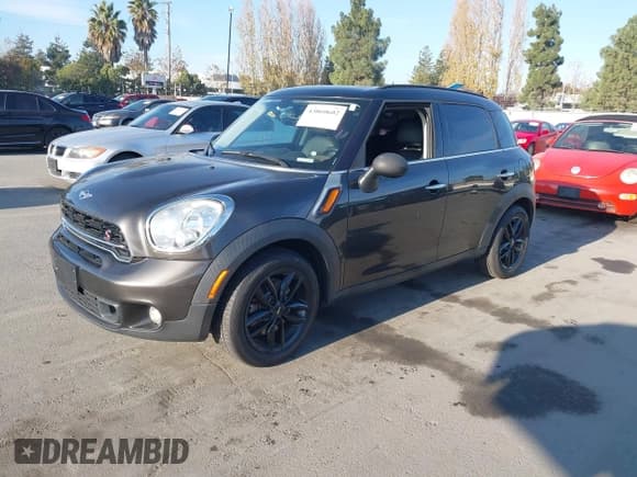 ✅ 2015 MINI Countryman S • VIN: WMWZC3C58FWT03263 • Lot: 43860602. Listed on IAAI with 99,653 mi. Free auction sales archive from the USA and detailed vehicle history report at DreamBid. Image 2.