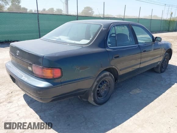 ✅ 1993 Toyota Camry DLX • VIN: 4T1SK11E1PU289746 • Lot: 42943871. Listed on IAAI with 201,241 mi. Free auction sales archive from the USA and detailed vehicle history report at DreamBid. Image 4.