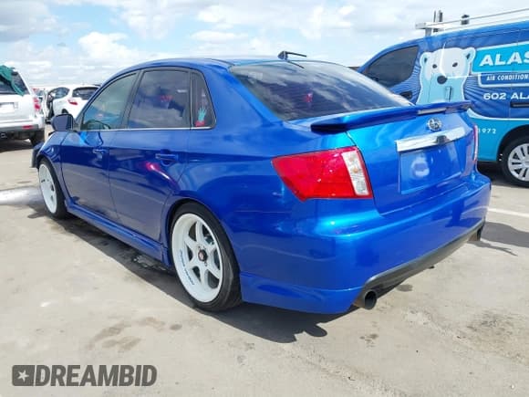 ✅ 2009 Subaru WRX w/Premium Pkg • VIN: JF1GE76619G521520 • Lot: 41577390. Listed on IAAI with 149,257 mi. Free auction sales archive from the USA and detailed vehicle history report at DreamBid. Image 3.