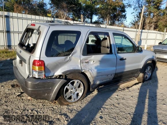 ✅ 2003 Ford Escape XLT Popular 2 • VIN: 1FMYU93103KA09706 • Lot: 87019765. Wystawiony na Copart z przebiegiem 150 643 mil. Bezpłatny archiwum sprzedaży aukcyjnych z USA i szczegółowy raport historii pojazdu na DreamBid. Zdjęcie 3.