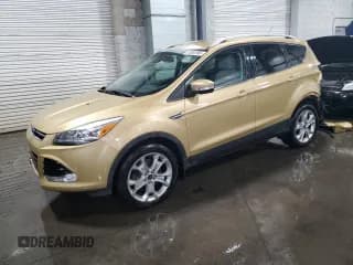 ✅ 2015 Ford Escape Titanium • VIN: 1FMCU9JX0FUC04876 • Lot: 87062395. Listed on Copart with 118,893 mi. Free auction sales archive from the USA and detailed vehicle history report at DreamBid. Image 1.