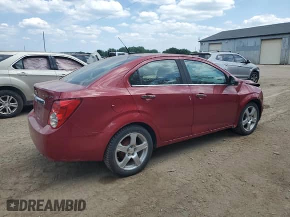 2012 Chevrolet Sonic LTZ with VIN 1G1JE5SH5C4152268, listed as a Copart auction lot 61047295 with 137,502 mi miles and Salvage title. Bid and sale history available at DreamBid. Image 3.