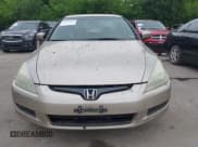 ✅ 2003 Honda Accord LX • VIN: 1HGCM66363A062623 • Lot: 42437853. Listed on IAAI with 264,727 mi. Free auction sales archive from the USA and detailed vehicle history report at DreamBid. Image 12.