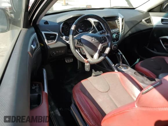 ✅ 2012 Hyundai Veloster w/Red Int • VIN: KMHTC6AD9CU058948 • Lot: 56570814. Wystawiony na Copart z przebiegiem 141 460 mil. Bezpłatny archiwum sprzedaży aukcyjnych z USA i szczegółowy raport historii pojazdu na DreamBid. Zdjęcie 8.