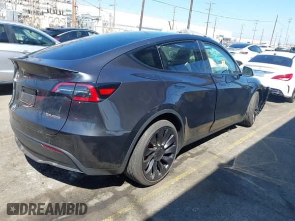 ✅ 2025 Tesla Model Y Performance • VIN: 7SAYGDEF1SF245917 • Lot: 43196307. Listed on IAAI with Not provided. Free auction sales archive from the USA and detailed vehicle history report at DreamBid. Image 4.