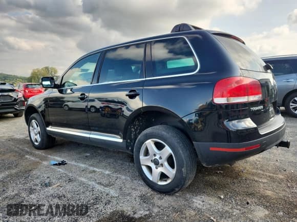 ✅ 2004 Volkswagen Touareg • VIN: WVGBC67L24D023910 • Lot: 82090745. Wystawiony na Copart z przebiegiem 199 832 mil. Bezpłatny archiwum sprzedaży aukcyjnych z USA i szczegółowy raport historii pojazdu na DreamBid. Zdjęcie 2.
