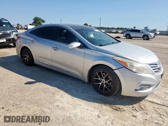 ✅ 2012 Hyundai Azera • VIN: KMHFH4JG8CA180568 • Лот: 71620145. Опубликован ранее на Copart с пробегом 192 343 миль. Бесплатный доступ к архиву аукционных продаж из США и подробный отчёт об истории автомобиля на DreamBid. Изображение 4.