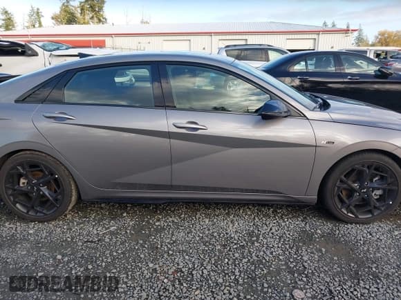 ✅ 2024 Hyundai Elantra N Line • VIN: KMHLR4DF7RU767595 • Лот: 43540090. Опубликован ранее на IAAI с пробегом 7 338 миль. Бесплатный доступ к архиву аукционных продаж из США и подробный отчёт об истории автомобиля на DreamBid. Изображение 13.