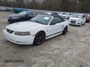 ✅ 2004 Ford Mustang Deluxe • VIN: 1FAFP44694F208401 • Lot: 43871483. Listed on IAAI with 133,344 mi. Free auction sales archive from the USA and detailed vehicle history report at DreamBid. Image 2.