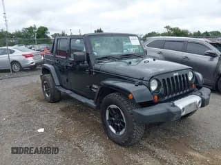 ✅ 2010 Jeep Wrangler Unlimited Sahara • VIN: 1J4BA5H11AL156817 • Lot: 43006011. Wystawiony na IAAI z przebiegiem 206 494 mil. Bezpłatny archiwum sprzedaży aukcyjnych z USA i szczegółowy raport historii pojazdu na DreamBid. Zdjęcie 1.