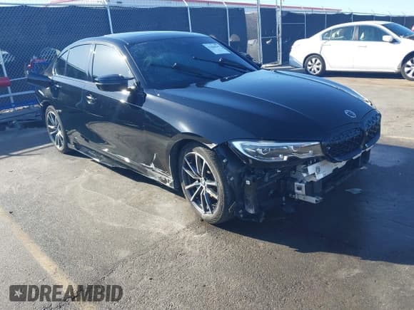 ✅ 2021 BMW 3 Series 330i • VIN: 3MW5R1J02M8C00810 • Lot: 43664365. Listed on IAAI with 48,765 mi. Free auction sales archive from the USA and detailed vehicle history report at DreamBid. Image 1.