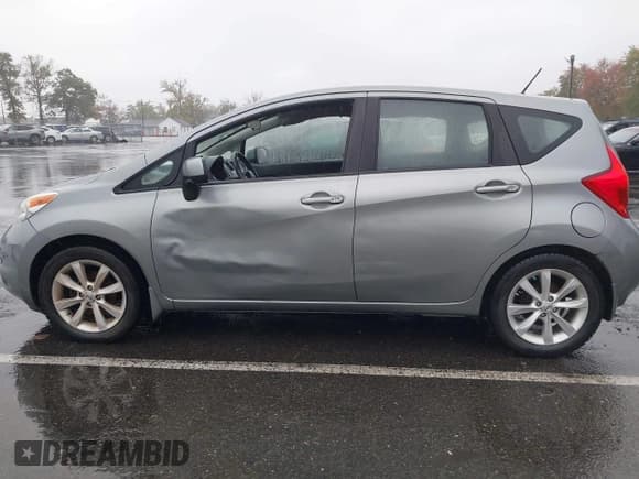 ✅ 2014 Nissan Note SV • VIN: 3N1CE2CP8EL437065 • Lot: 43426261. Listed on IAAI with 94,841 mi. Free auction sales archive from the USA and detailed vehicle history report at DreamBid. Image 14.