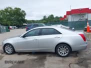 ✅ 2015 Cadillac CTS AWD • VIN: 1G6AW5SX3F0142431 • Lot: 43027413. Listed on IAAI with 125,276 mi. Free auction sales archive from the USA and detailed vehicle history report at DreamBid. Image 14.