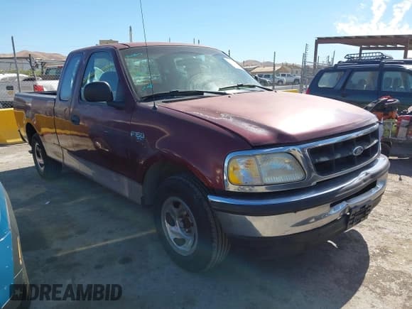 ✅ 1998 Ford F-150 • VIN: 1FTZX1722WNA53682 • Lot: 42869586. Listed on IAAI with 196,924 mi. Free auction sales archive from the USA and detailed vehicle history report at DreamBid. Image 1.