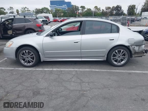 ✅ 2003 Nissan Altima SE • VIN: 1N4BL11D23C205500 • Лот: 42745926. Опубликован ранее на IAAI с пробегом 92 973 миль. Бесплатный доступ к архиву аукционных продаж из США и подробный отчёт об истории автомобиля на DreamBid. Изображение 15.