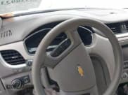 ✅ 2015 Chevrolet Traverse LS • VIN: 1GNKRFKD5FJ152528 • Lot: 43338923. Wystawiony na IAAI z przebiegiem Nie podano. Bezpłatny archiwum sprzedaży aukcyjnych z USA i szczegółowy raport historii pojazdu na DreamBid. Zdjęcie 7.