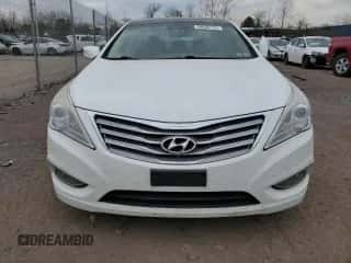 2013 Hyundai Azera z VIN KMHFH4JG7DA303424, wystawiony jako Copart lot #49836175 z przebiegiem 139 439 mil mil oraz Czysty tytuł • Clean title. Historia ofert i sprzedaży dostępna na DreamBid. Obrazek 5.