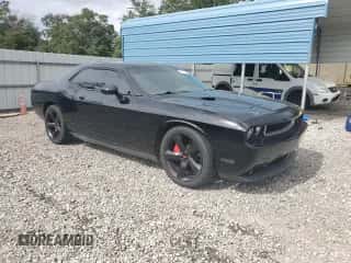 2013 Dodge Challenger SXT z VIN 2C3CDYAG7DH613511, wystawiony jako Copart lot #81931495 z przebiegiem 198 583 mil mil oraz Czysty tytuł • Clean title. Historia ofert i sprzedaży dostępna na DreamBid. Obrazek 4.