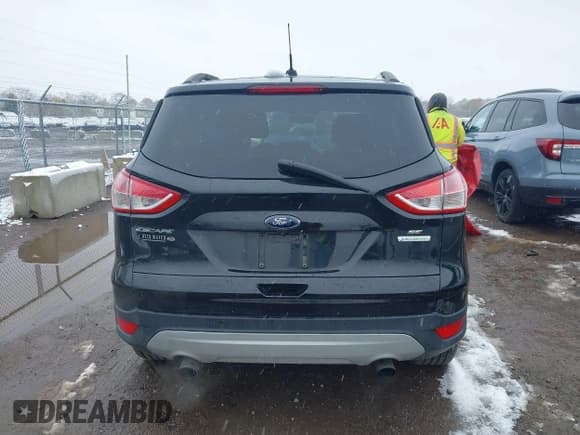 ✅ 2015 Ford Escape SE • VIN: 1FMCU0GX7FUC86673 • Lot: 43612141. Listed on IAAI with 124,543 mi. Free auction sales archive from the USA and detailed vehicle history report at DreamBid. Image 16.