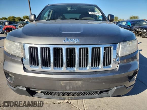 ✅ 2013 Jeep Grand Cherokee Laredo • VIN: 1C4RJFAG8DC529042 • Lot: 82599485. Listed on Copart with 119,884 mi. Free auction sales archive from the USA and detailed vehicle history report at DreamBid. Image 5.