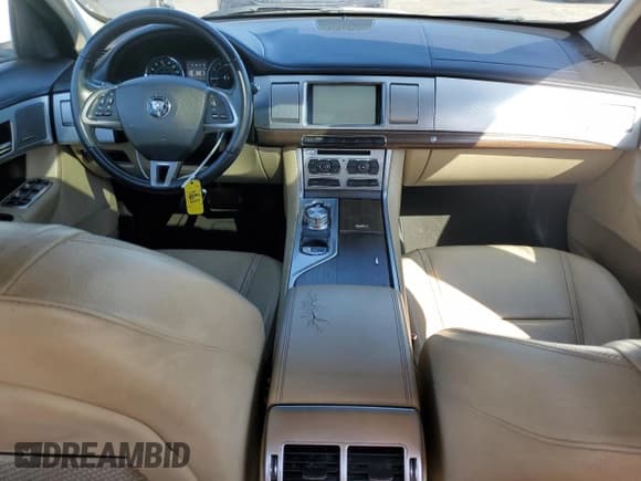 ✅ 2014 Jaguar XF SC • VIN: SAJWA0EX6E8U22068 • Лот: 48970025. Опубликован ранее на Copart с пробегом 51 218 миль. Бесплатный доступ к архиву аукционных продаж из США и подробный отчёт об истории автомобиля на DreamBid. Изображение 8.