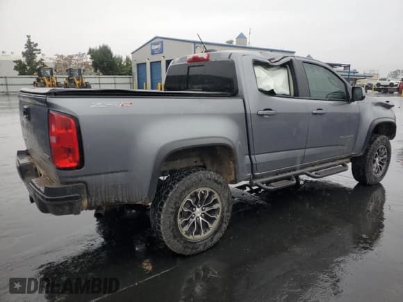 ✅ 2021 Chevrolet Colorado 4WD ZR2 • VIN: 1GCGTEEN9M1105403 • Lot: 90459785. Listed on Copart with 17,683 mi. Free auction sales archive from the USA and detailed vehicle history report at DreamBid. Image 3.