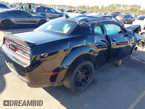 2023 Dodge Challenger R/T Scat Pack z VIN 2C3CDZFJ5PH610170, wystawiony jako IAAI lot #40908987 z przebiegiem 11 050 mil mil oraz . Historia ofert i sprzedaży dostępna na DreamBid. Obrazek 4.