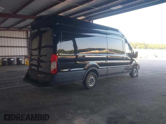 ✅ 2021 Ford Transit Cargo • VIN: 1FTBR3XG8MKA89703 • Lot: 42885214. Listed on IAAI with 79,907 mi. Free auction sales archive from the USA and detailed vehicle history report at DreamBid. Image 4.