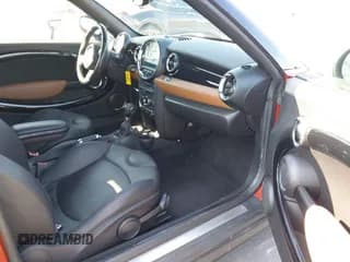 ✅ 2013 MINI Roadster • VIN: WMWSY1C55DT311925 • Lot: 43757747. Wystawiony na IAAI z przebiegiem 118 227 mil. Bezpłatny archiwum sprzedaży aukcyjnych z USA i szczegółowy raport historii pojazdu na DreamBid. Zdjęcie 5.