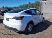 ✅ 2023 Tesla Model Y Long Range • VIN: 7SAYGDEE0PA121598 • Lot: 43410965. Listed on IAAI with 45,807 mi. Free auction sales archive from the USA and detailed vehicle history report at DreamBid. Image 4.