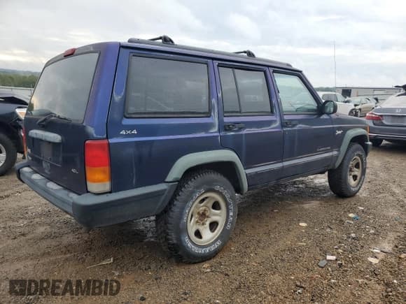 ✅ 1997 Jeep Cherokee Sport • VIN: 1J4FJ68S5VL539634 • Lot: 82171165. Listed on Copart with 266,479 mi. Free auction sales archive from the USA and detailed vehicle history report at DreamBid. Image 3.