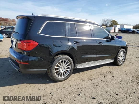 ✅ 2014 Mercedes-Benz GL 450 • VIN: 4JGDF7CE4EA389299 • Lot: 90535795. Listed on Copart with 139,587 mi. Free auction sales archive from the USA and detailed vehicle history report at DreamBid. Image 3.