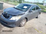 ✅ 2010 Toyota Corolla • VIN: JTDBU4EE0AJ075558 • Lot: 42333233. Listed on IAAI with 98,969 mi. Free auction sales archive from the USA and detailed vehicle history report at DreamBid. Image 17.