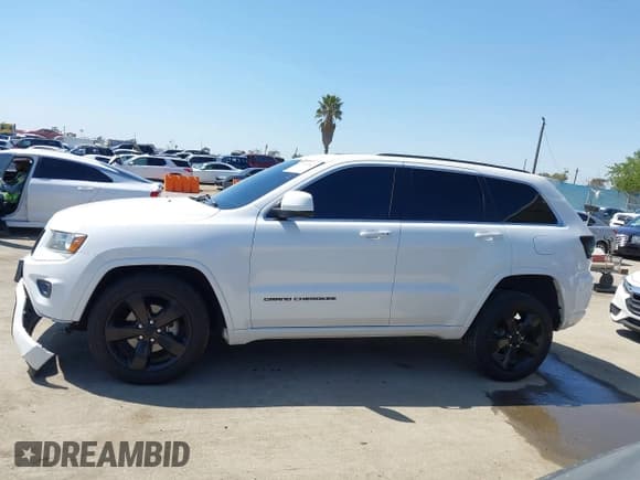 ✅ 2015 Jeep Grand Cherokee Laredo • VIN: 1C4RJEAG5FC713755 • Лот: 41969582. Опубликован ранее на IAAI с пробегом 106 213 миль. Бесплатный доступ к архиву аукционных продаж из США и подробный отчёт об истории автомобиля на DreamBid. Изображение 14.