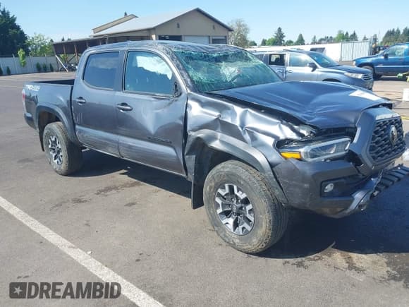 ✅ 2021 Toyota Tacoma SR • VIN: 3TMCZ5AN2MM387079 • Lot: 42164603. Listed on IAAI with 42,794 mi. Free auction sales archive from the USA and detailed vehicle history report at DreamBid. Image 1.