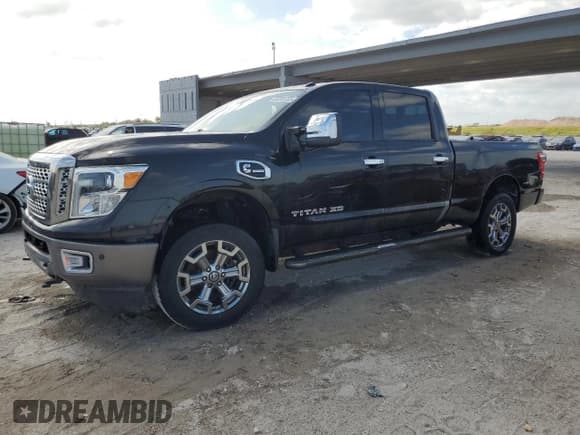 ✅ 2016 Nissan Titan Platinum Reserve • VIN: 1N6BA1F25GN508897 • Lot: 55090755. Listed on Copart with 175,850 mi. Free auction sales archive from the USA and detailed vehicle history report at DreamBid. Image 1.