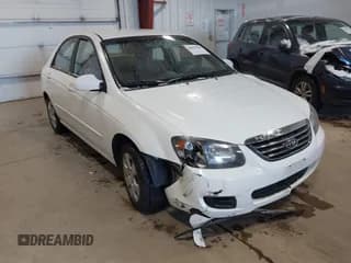 ✅ 2009 Kia Spectra EX • VIN: KNAFE221795662135 • Lot: 43847748. Listed on IAAI with 99,869 mi. Free auction sales archive from the USA and detailed vehicle history report at DreamBid. Image 1.