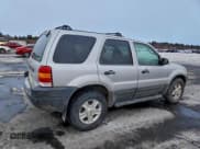 ✅ 2003 Ford Escape XLT Popular 2 • VIN: 1FMYU93133KB85553 • Lot: 95891575. Listed on Copart with 130,488 mi. Free auction sales archive from the USA and detailed vehicle history report at DreamBid. Image 3.
