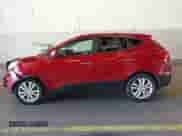 2010 Hyundai Tucson GLS with VIN KM8JUCAC5AU103469, listed as a IAAI auction lot 43394997 with 123,949 mi miles and . Bid and sale history available at DreamBid. Image 14.