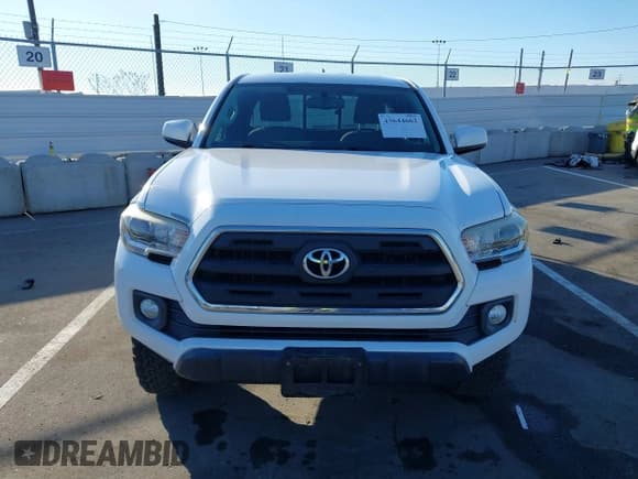 ✅ 2017 Toyota Tacoma TRD Off Road • VIN: 5TFSZ5AN5HX077438 • Lot: 43644662. Listed on IAAI with 148,795 mi. Free auction sales archive from the USA and detailed vehicle history report at DreamBid. Image 12.