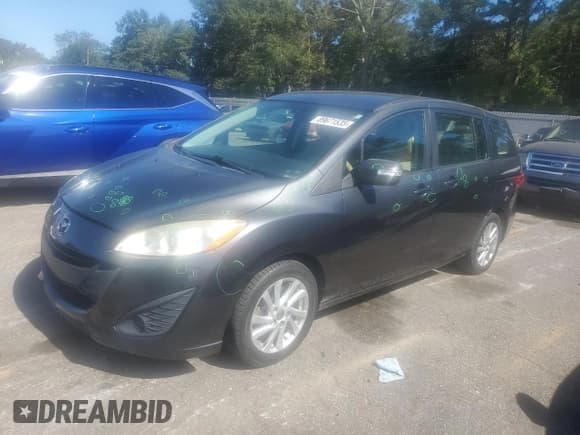 ✅ 2014 Mazda 5 Sport • VIN: JM1CW2BLXE0165897 • Lot: 89671535. Listed on Copart with 101,684 mi. Free auction sales archive from the USA and detailed vehicle history report at DreamBid. Image 1.