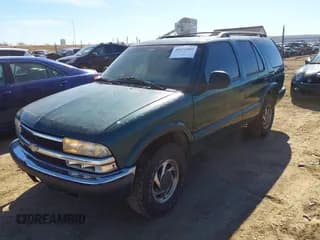✅ 1998 Chevrolet Blazer LT • VIN: 1GNDT13WXW2234455 • Lot: 41672409. Wystawiony na IAAI z przebiegiem 258 433 mil. Bezpłatny archiwum sprzedaży aukcyjnych z USA i szczegółowy raport historii pojazdu na DreamBid. Zdjęcie 2.