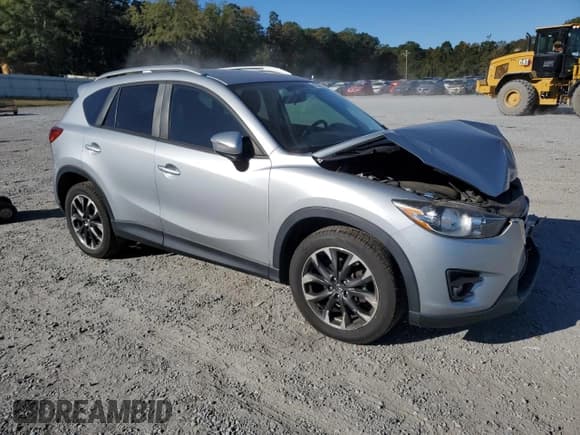 ✅ 2016 Mazda CX-5 Grand Touring • VIN: JM3KE4DY3G0838560 • Lot: 82567945. Listed on Copart with 74,284 mi. Free auction sales archive from the USA and detailed vehicle history report at DreamBid. Image 4.