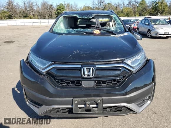 ✅ 2020 Honda CR-V Touring • VIN: 2HKRW2H92LH612695 • Lot: 84559165. Wystawiony na Copart z przebiegiem 62 150 mil. Bezpłatny archiwum sprzedaży aukcyjnych z USA i szczegółowy raport historii pojazdu na DreamBid. Zdjęcie 5.