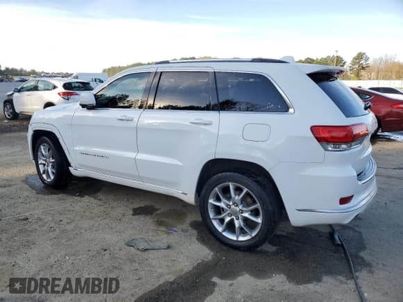 ✅ 2015 Jeep Grand Cherokee Summit • VIN: 1C4RJEJG0FC118974 • Lot: 49002165. Listed on Copart with 112,463 mi. Free auction sales archive from the USA and detailed vehicle history report at DreamBid. Image 2.